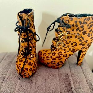 Leopard boot heals,slightly worn but still is good condition
